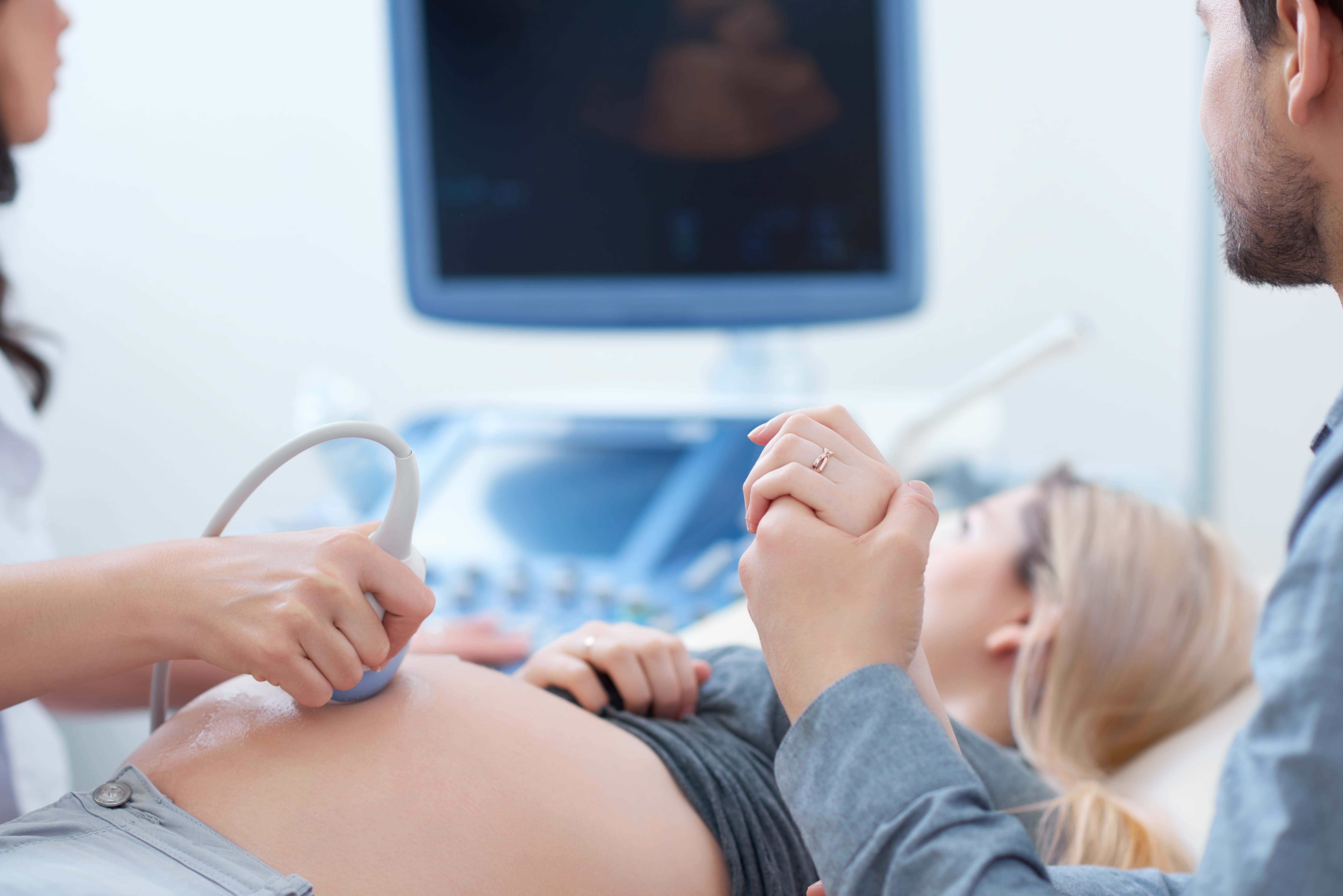 pregnant woman getting ultrasound