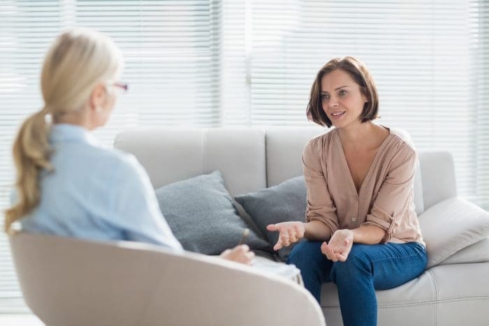 Woman talking to therapist