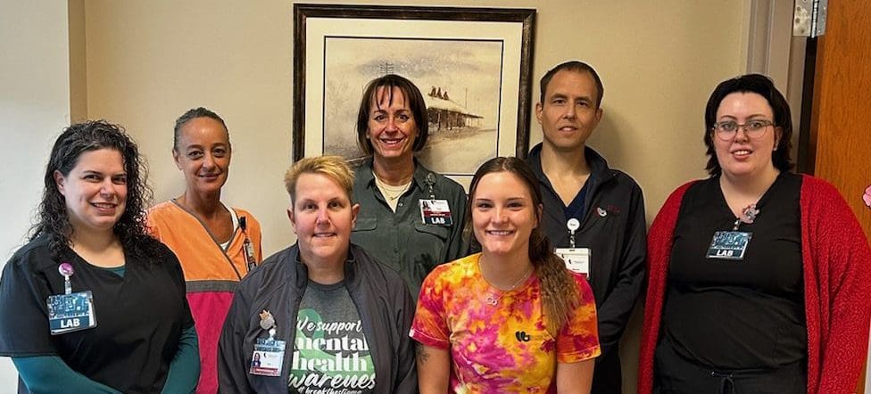 Group photo of nurses and staff members at Virginia Gay Hospital, celebrating lab week